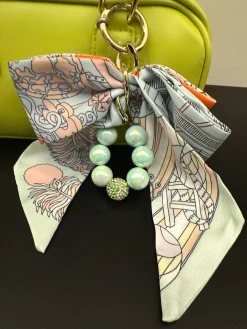 Online Borsa lime con charm Borse
