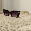 Outlet Occhiale nero cat stecche gold lenti sfumate Occhiali