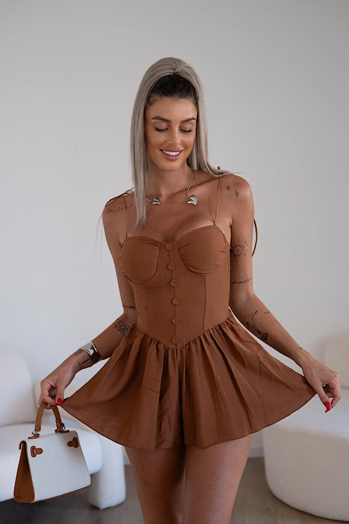 Sale Tutina choco con bottoncini Completi & Tute